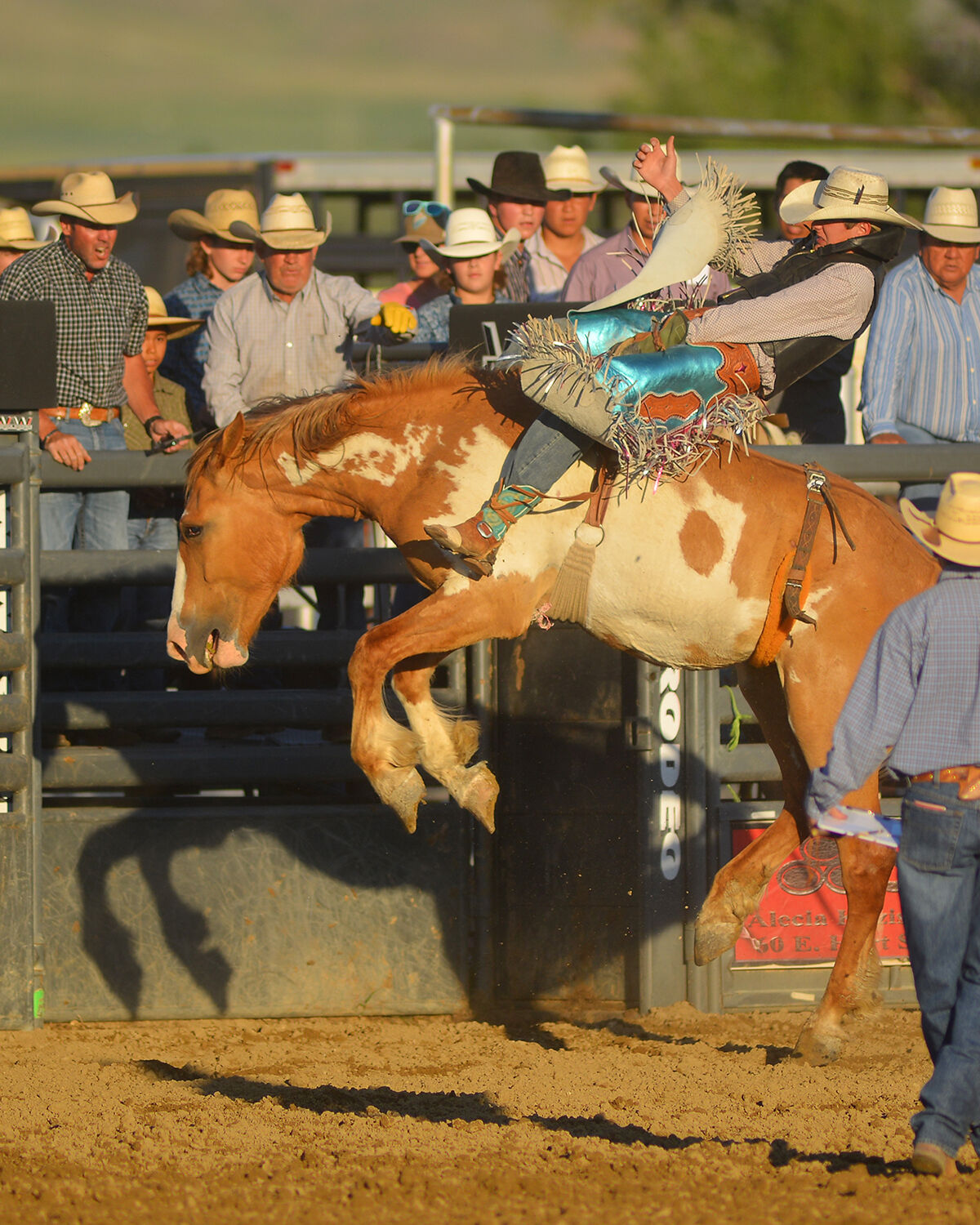 Chaz Dewey pulls himself back with his hand up in the air